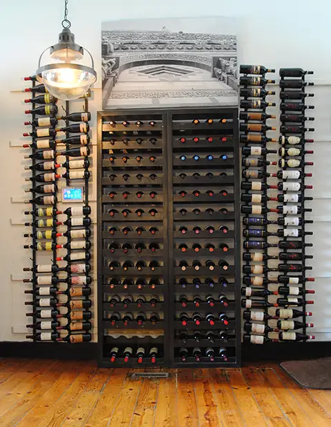 Our wine wall, where all the selection from the il Cigno Italiano wine list can be found